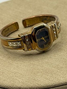Pierre Jacquard Gold Tone Cuff Watch Rhinestones Metal Band Blue Octagon Dial